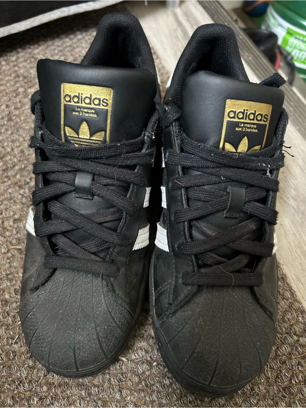 adidas Black Sneakers with White Three Stripes and Gold Label